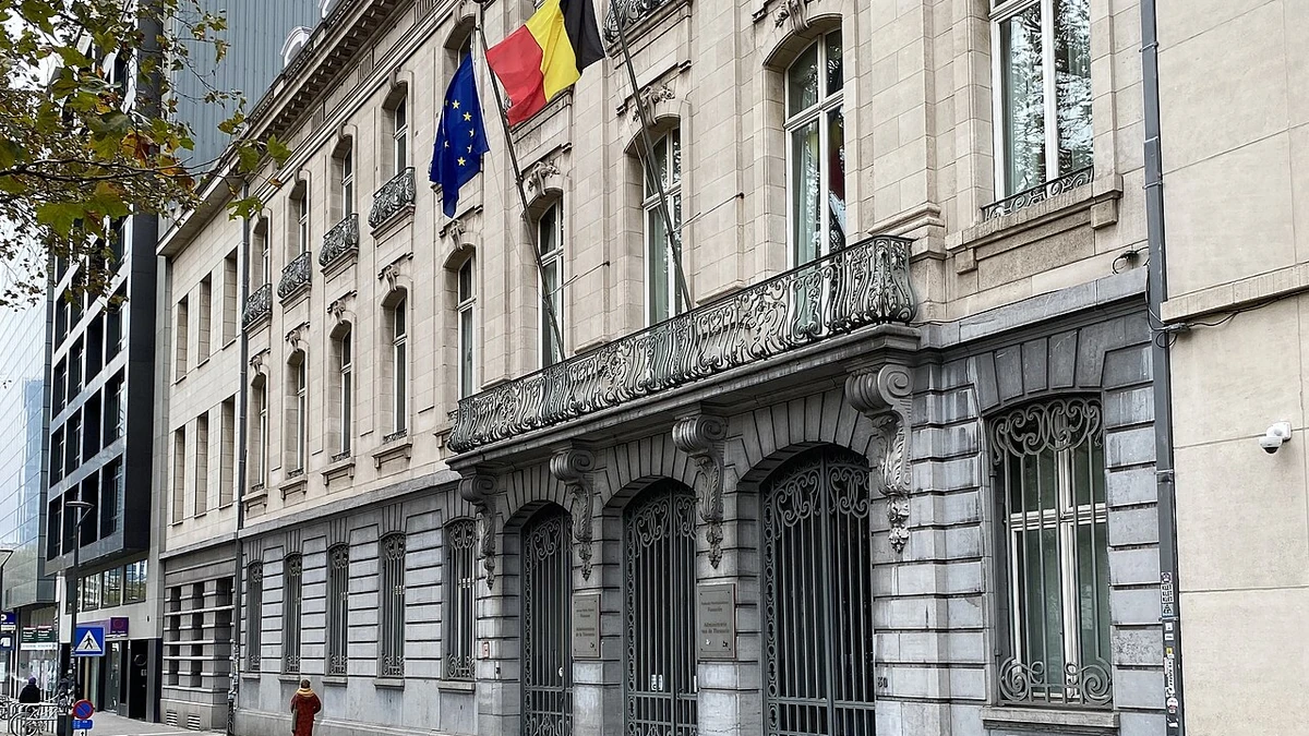 Belgian and European Union flags outside the building at Avenue des Arts 30 in Brussels.