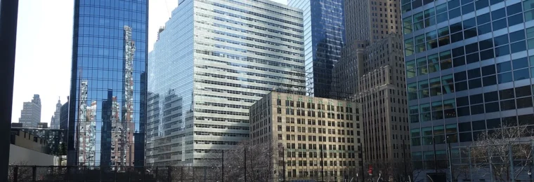 Lower Manhattan view from Battery Park City, with 240 Greenwich Street, BNY’s headquarters, visible in the background.