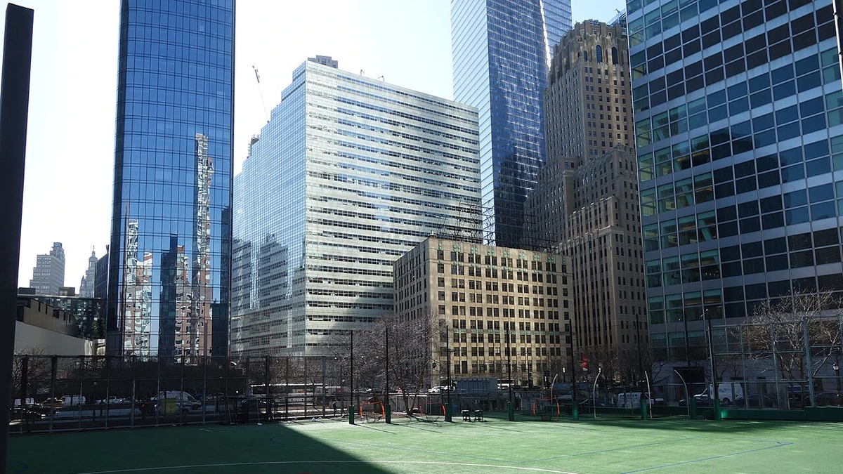 Lower Manhattan view from Battery Park City, with 240 Greenwich Street, BNY’s headquarters, visible in the background.