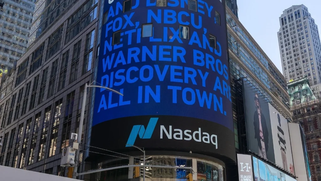 Nasdaq MarketSite tower in Times Square with the Nasdaq sign visible on its digital display.