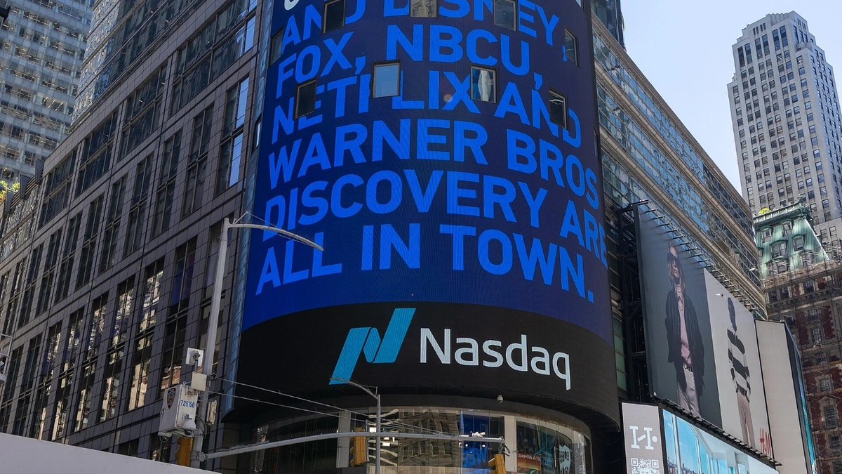 Nasdaq MarketSite tower in Times Square with the Nasdaq sign visible on its digital display.
