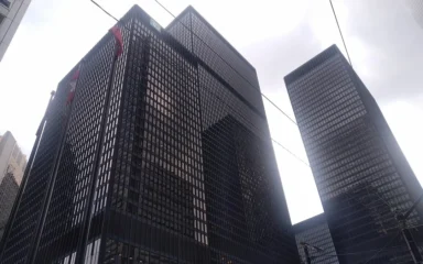 Office towers in Toronto’s Financial District viewed from street level.