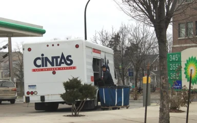 A Cintas delivery truck parked on a street in Ann Arbor, Michigan.