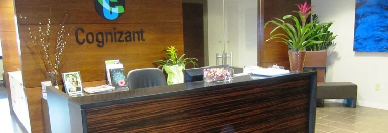 Reception area at Cognizant's office in Teaneck, New Jersey, with Cognizant branding on the wall.
