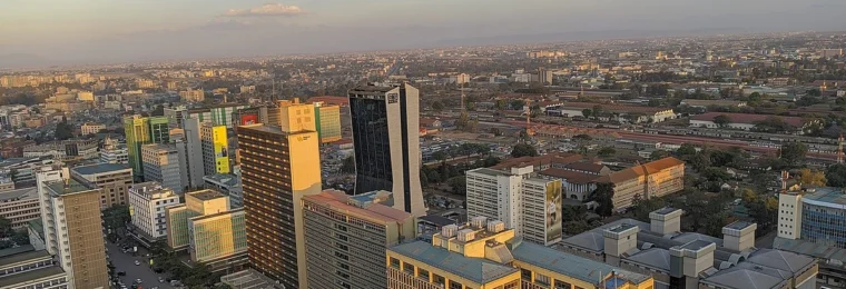 Aerial view of Nairobi's central business district in late-afternoon light.