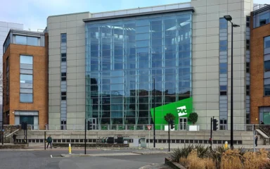 OVO Energy office building in Bristol with green OVO signage above the entrance.