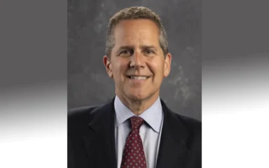 Official portrait of Federal Reserve Governor Michael S. Barr.