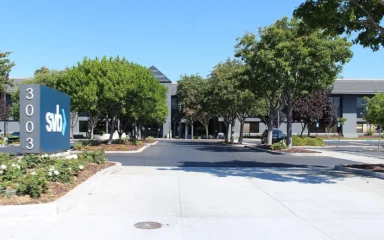 Silicon Valley Bank headquarters at 3003 Tasman Drive in Santa Clara, California, with the SVB sign visible at left.