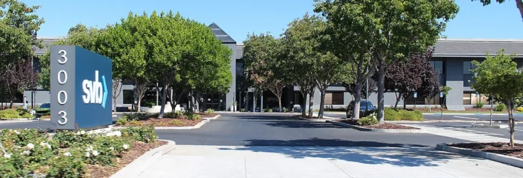Silicon Valley Bank headquarters at 3003 Tasman Drive in Santa Clara, California, with the SVB sign visible at left.