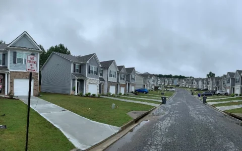 Rows of suburban homes along a residential street in the United States.