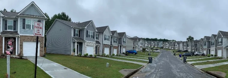Rows of suburban homes along a residential street in the United States.