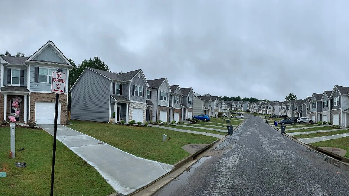 Rows of suburban homes along a residential street in the United States.