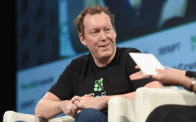 Mike Cagney speaking onstage at TechCrunch Disrupt NY in 2017.