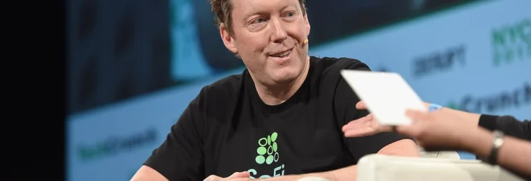 Mike Cagney speaking onstage at TechCrunch Disrupt NY in 2017.