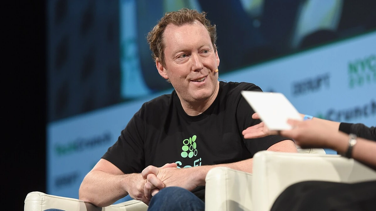 Mike Cagney speaking onstage at TechCrunch Disrupt NY in 2017.