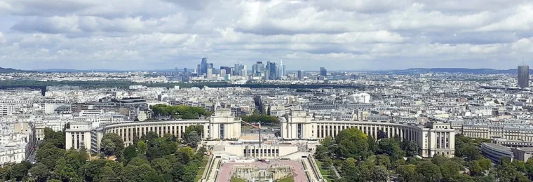 View across Paris toward the La Défense business district from the Eiffel Tower.