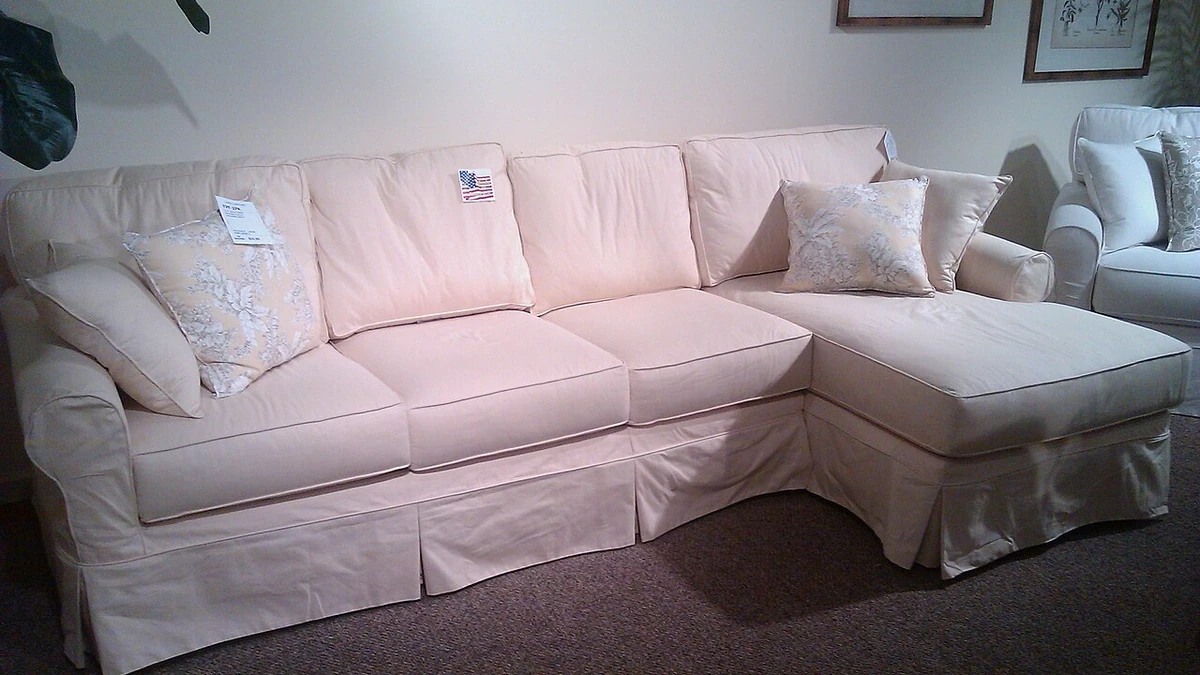 Light-colored sectional sofa on display at High Point Market in North Carolina.