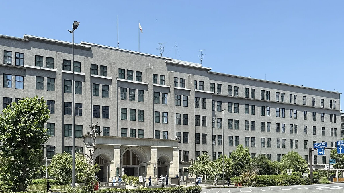 Japan Ministry of Finance headquarters building in Tokyo under a blue sky.