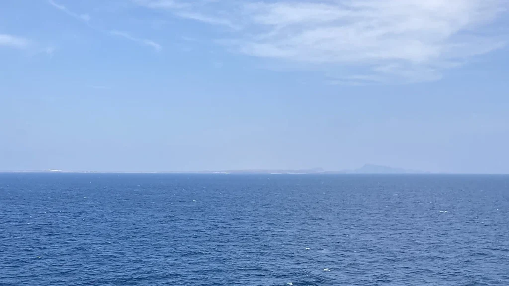 View across the Bab el-Mandeb Strait with Yemen visible in the distance.