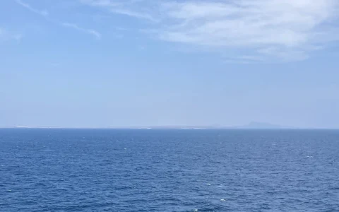 View across the Bab el-Mandeb Strait with Yemen visible in the distance.