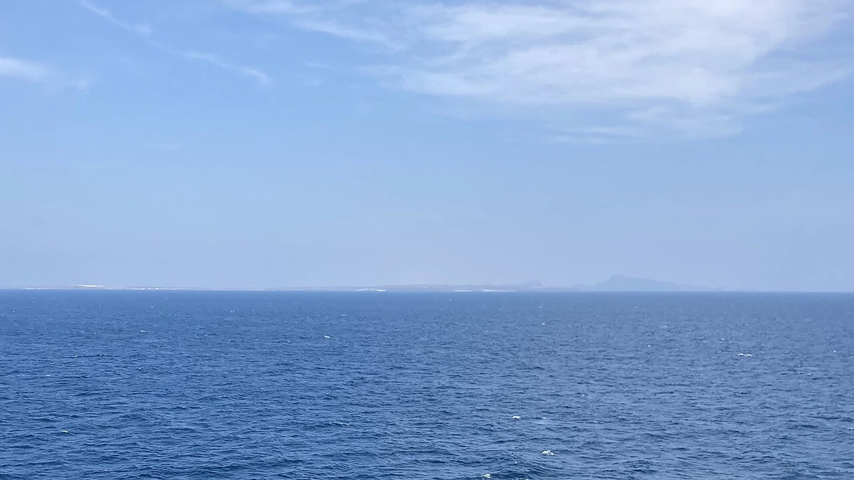 View across the Bab el-Mandeb Strait with Yemen visible in the distance.