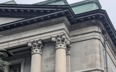 Stone facade and columns of the Bank of Japan Head Office in Tokyo.
