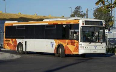 Transit Systems-operated Transport Victoria bus turning onto Durham Road in Sunshine, Victoria.