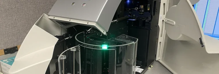Leica AT2 microscopy slide scanner with its cover open.