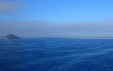 Mauao at left with Matakana Island stretching across the horizon in New Zealand’s Bay of Plenty.