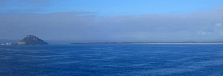 Mauao at left with Matakana Island stretching across the horizon in New Zealand’s Bay of Plenty.