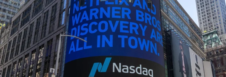 Nasdaq MarketSite tower in Times Square with the Nasdaq logo visible on its digital display.