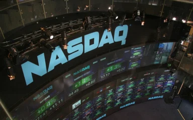 NASDAQ stock market display wall at Times Square in New York.