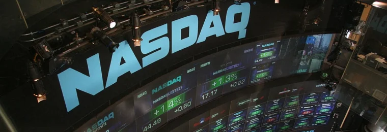 NASDAQ stock market display wall at Times Square in New York.