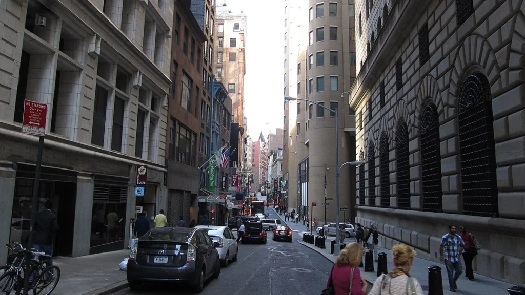 Nassau Street in Lower Manhattan alongside the Federal Reserve Bank of New York building.