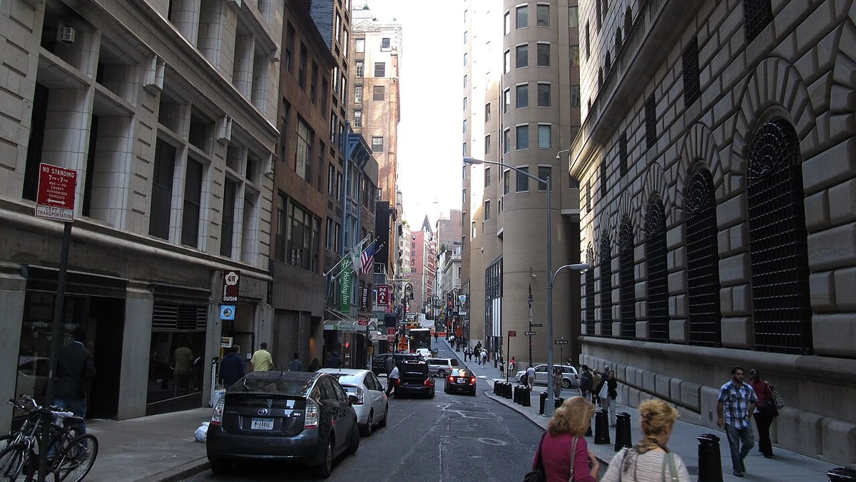 Nassau Street in Lower Manhattan alongside the Federal Reserve Bank of New York building.