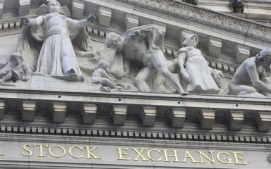 Stone facade of the New York Stock Exchange building in New York City.