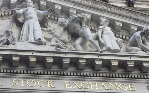 Stone facade of the New York Stock Exchange building in New York City.