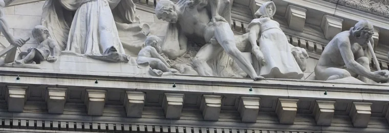 Stone facade of the New York Stock Exchange building in New York City.