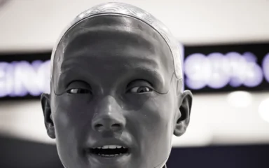 Close-up of a humanoid robot displayed at a technology exhibition.
