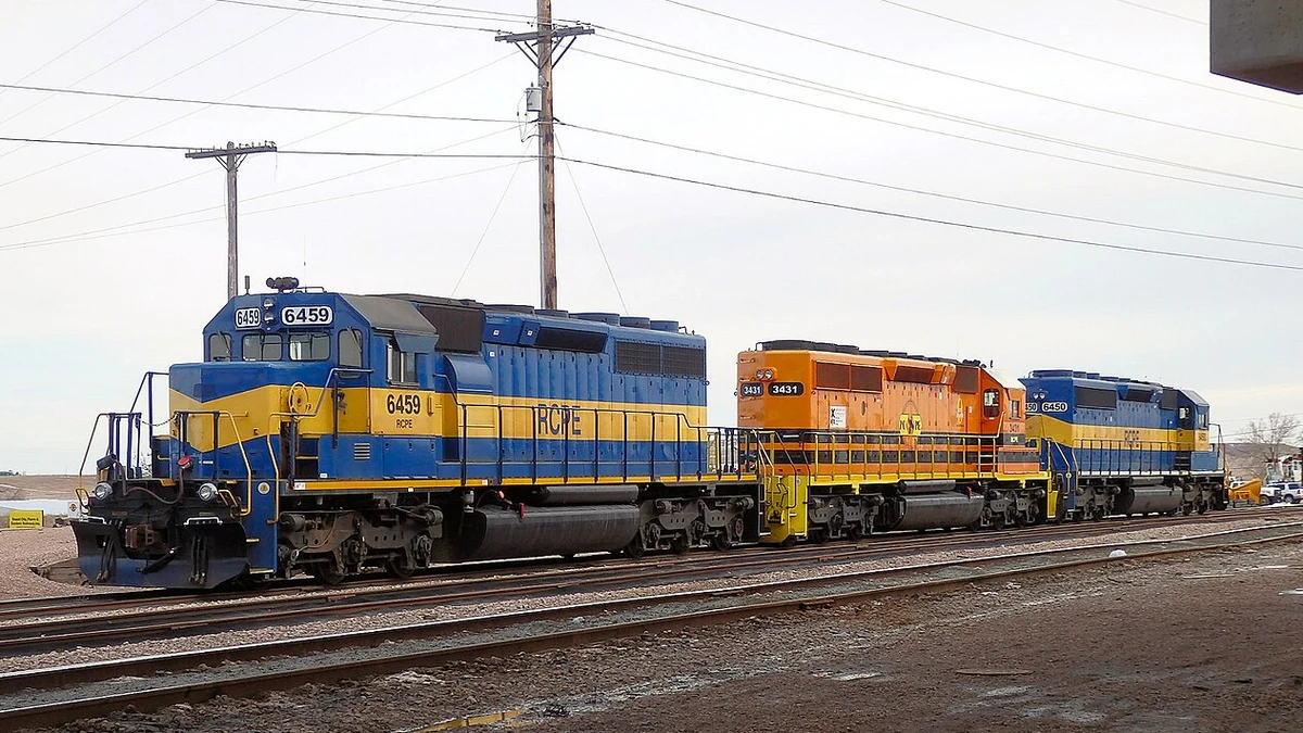 Rapid City, Pierre & Eastern Railroad locomotives 6459, 3431 and 6450 on railroad tracks.