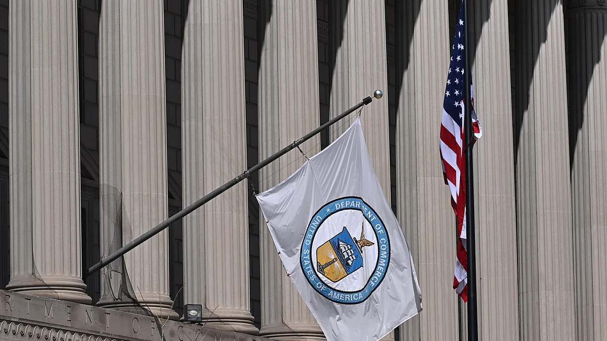 U.S. Department of Commerce flag outside the Herbert C. Hoover Building in Washington, D.C.