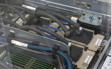 Four NVIDIA H100 GPUs installed in a TSUBAME 4.0 supercomputer computing node.