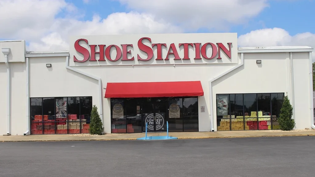 Shoe Station storefront in Albany, Georgia, with red Shoe Station signage above the entrance.