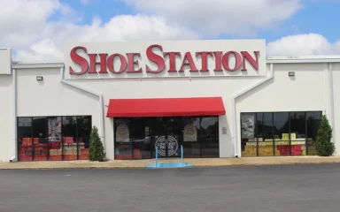 Shoe Station storefront in Albany, Georgia, with red Shoe Station signage above the entrance.