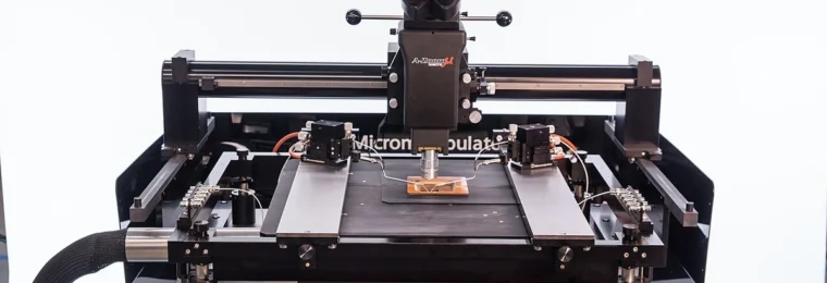 Semiconductor probe station with microscope and precision testing fixtures.