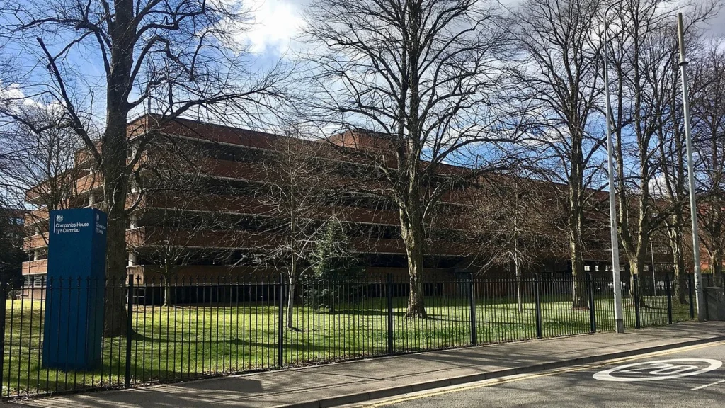 Companies House building and sign in Cardiff, Wales.
