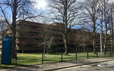 Companies House building and sign in Cardiff, Wales.