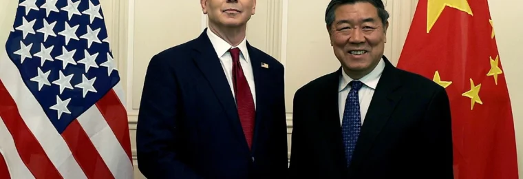 U.S. Treasury Secretary Scott Bessent and Chinese Vice Premier He Lifeng shake hands between U.S. and Chinese flags during trade talks in Geneva in May 2025.
