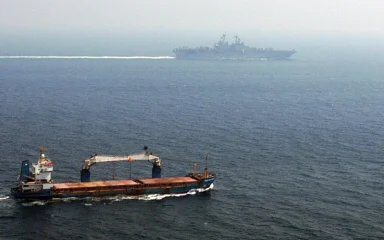 Merchant ship transiting the Strait of Hormuz.