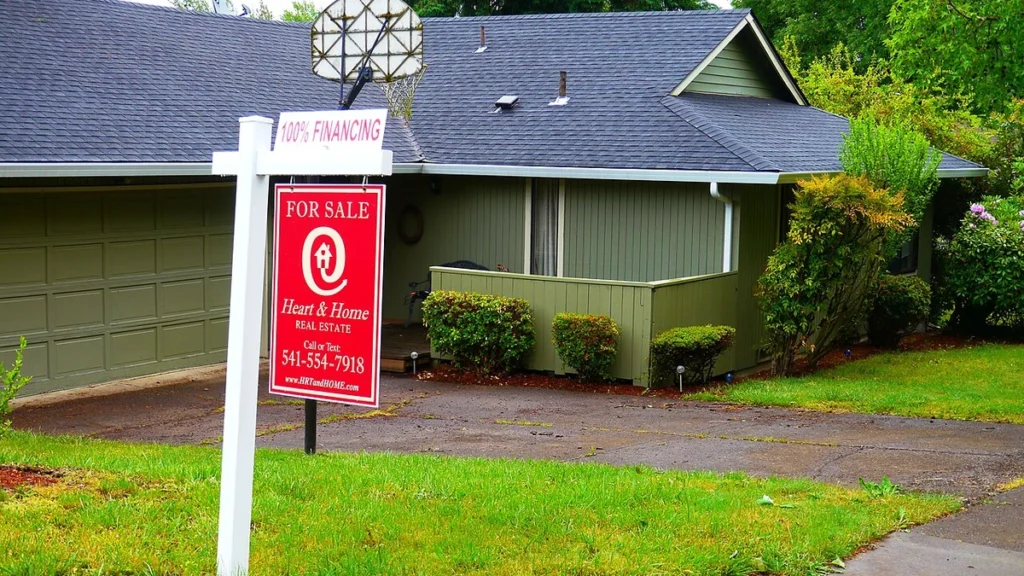 For sale sign in front of a house in Eugene, Oregon.